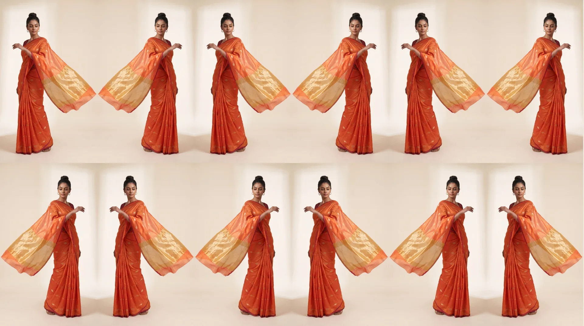 Saffron saris repeated across a studio wall